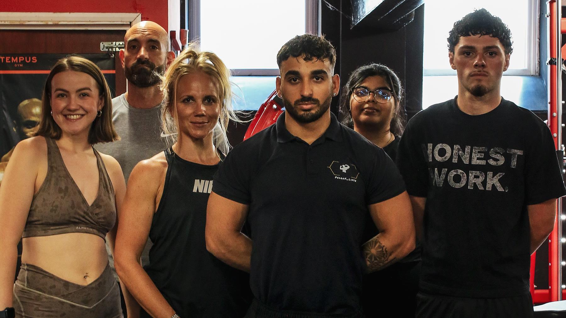 Pedro with five of his clients at the gym on James Street West